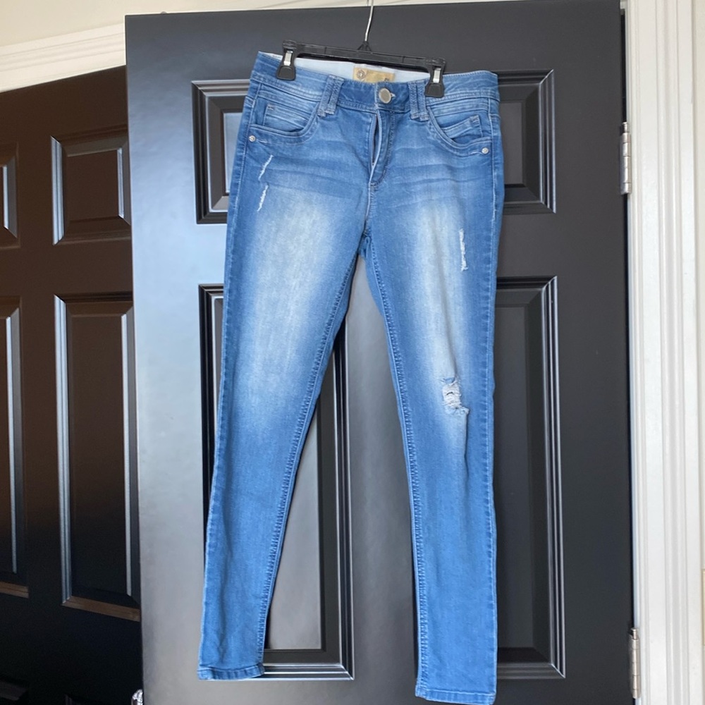 Democracy blue jeans with distressing.